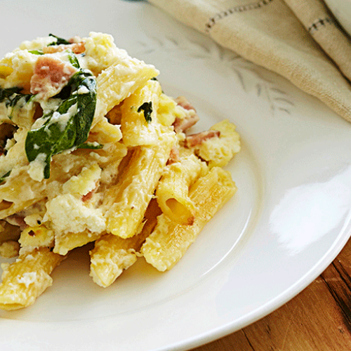 Pennette pasta with ricotta cheese, speck and chard