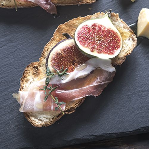  Bruschetta with figs, raw ham and parmesan