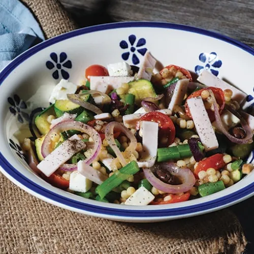 Fregola fredda con zucchine, prosciutto cotto e pomodorini