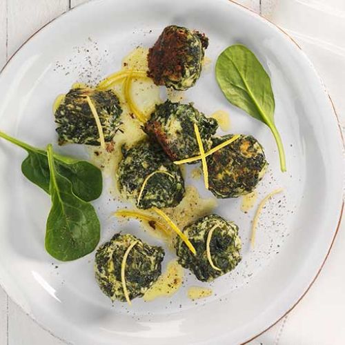 Spinach and ricotta gnocchi with prosciutto cotto