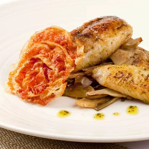 Rana pescatrice con carciofi e pancetta