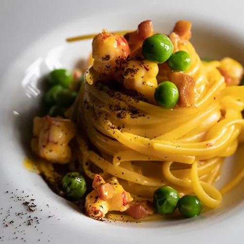 Linguina carbonara di gambero e pancetta dolce e piselli 
