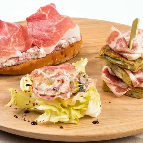tris di antipasti con culatello, coppa e pancetta